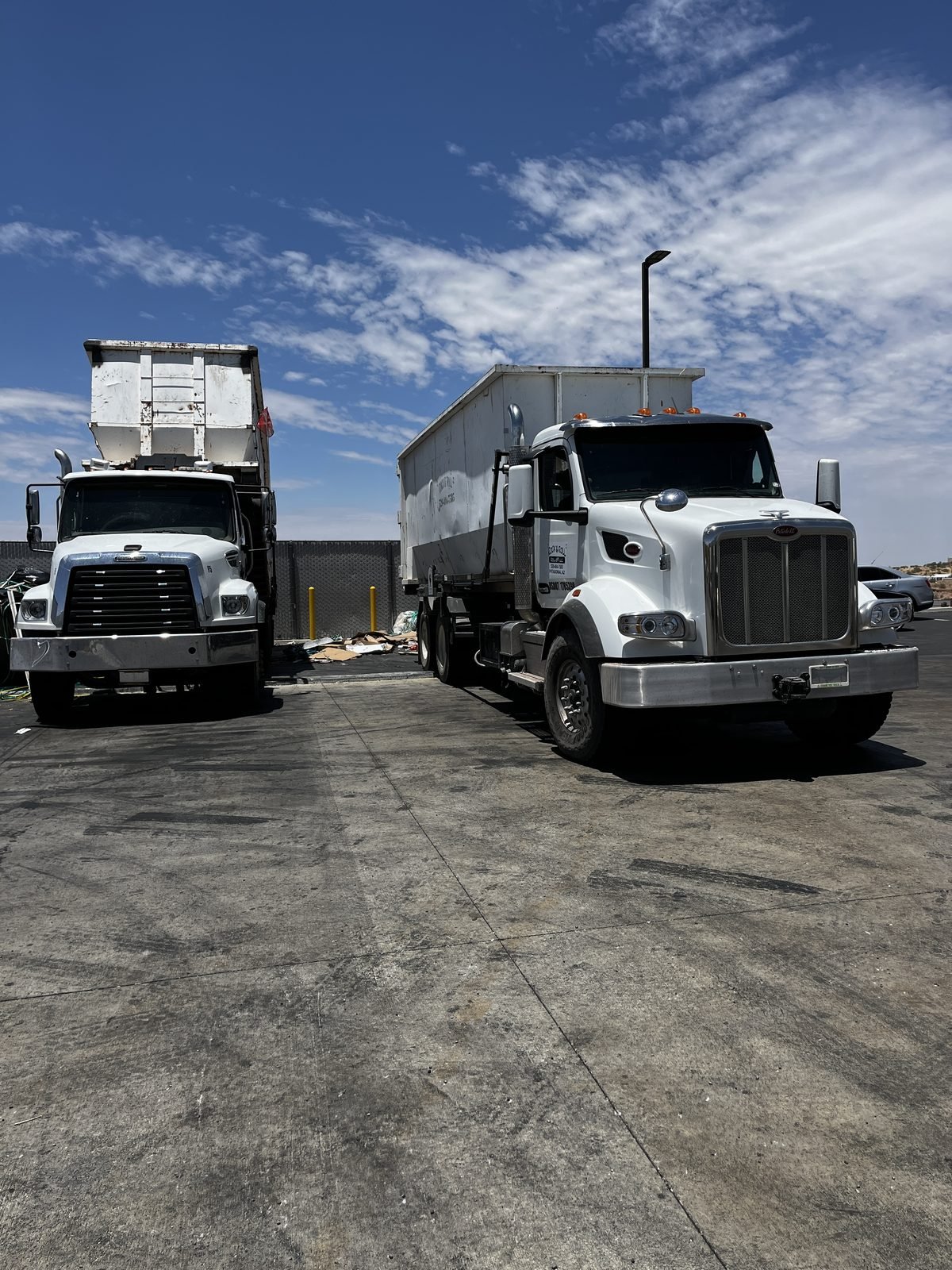 Rock & Roll Roll-Offs roll-off trucks and containers ready for service in Southern Arizona